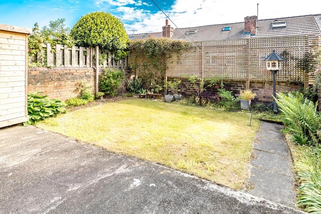 The private rear garden is larger than expected, says the sale brochure.