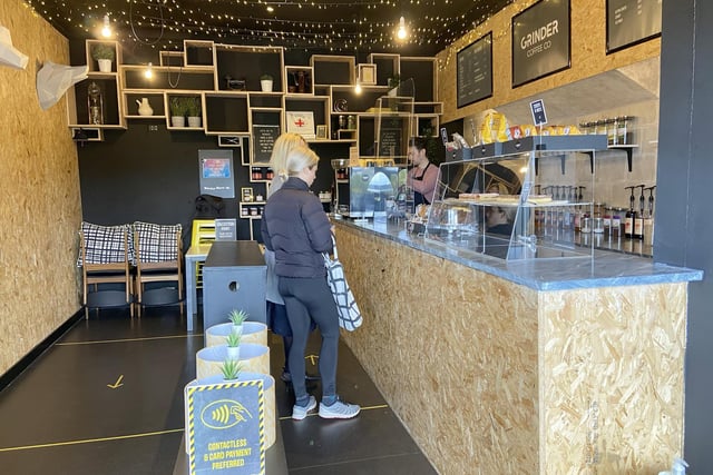 Customers visit Grinder Coffee Shop.