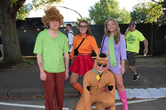 Revellers dress up as characters from Scooby Doo, including Shaggy (L): Vernon Nash (180424-0811)