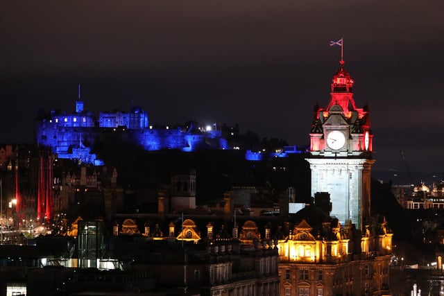 Edinburgh Castle lit up on Hogmanay. Photo credit: Andrew Milligan/PA Wire