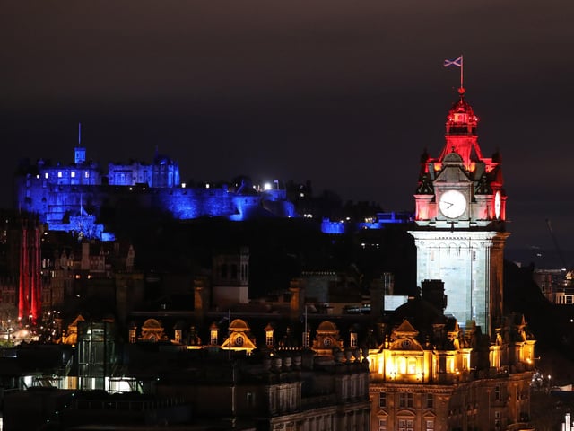 Edinburgh Castle lit up on Hogmanay. Photo credit: Andrew Milligan/PA Wire