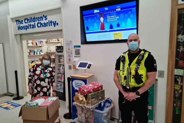 Roads Policing Sergeant Brandon Brown with the presents. Photo: South Yorkshire Police.