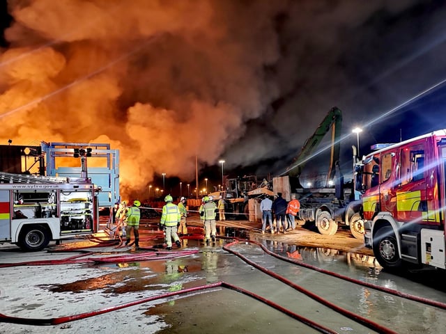 Dramatic pictures show firefighters at the scene of the blaze at Balby Carr Bank recycling site, this evening. PIcture: South Yorkshire Fire and Rescue Service