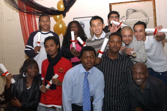 Young people are pictured with awards, presented at an event organised by Sheffield Futures to mark Black History Month in 2004
