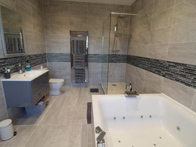 The master bedroom also has its own dressing room and the house has four further en-suites