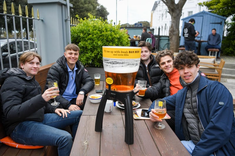 Members of the public enjoy food and a drink at Brewhouse & Kitchen pub at Southsea. Picture: Finnbarr Webster/Getty Images