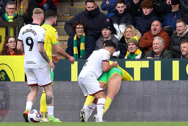 George Baldock of Sheffield United and Max Aarons of Norwich City clash: Stephen Pond/Getty Images