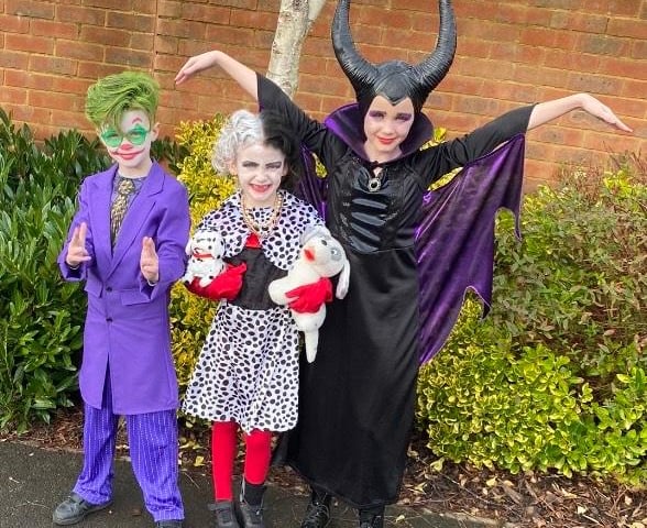 Teddy Hartnett aged 7 as ‘The Joker’, Kitty Hartnett aged 6 as ‘Cruella Deville’ and Blu-Belle Hartnett age 9 as ‘Malificent’ from Emsworth Hampshire