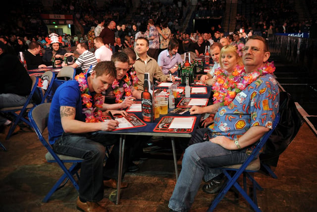 Pictured at Sheffield Arena, at the Premier League Darts, fans let the party start in 2008