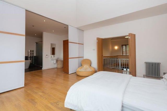 The bedroom is accessible from the landing through an impressive double door entry.