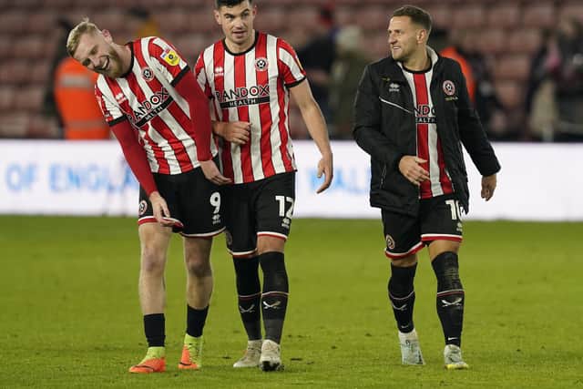 Sheffield United trio Oli McBurnie, John Egan and Billy Sharp are important figures in the dressing room: Andrew Yates / Sportimage
