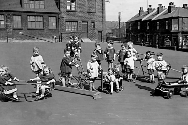 An early photo showing children playing at Brightside nursery school