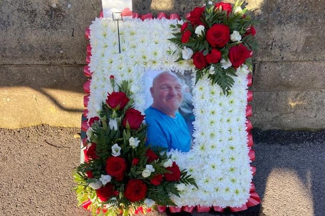 One of his family's favourite photos of Ian was included in another wreath.