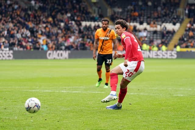 Nottingham Forest's Brennan Johnson scores the opening goal against Hull City during the Sky Bet Championship match at the MKM Stadium. Tim Goode/PA Wire.