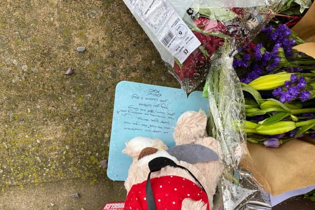 Floral tributes have been left at Metropolitan Hotel, Sheffield where a five-year-old boy fell to his death.