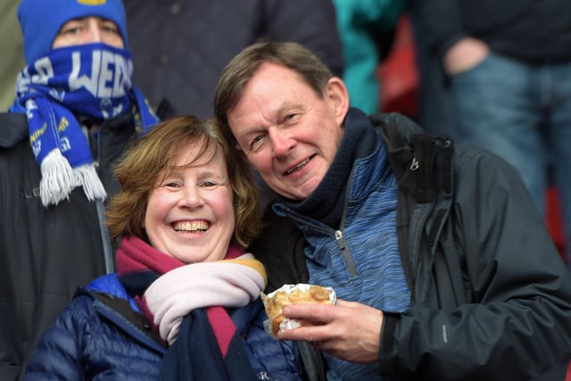 Sheffield Wednesday fans warm up with a pie at Doncaster Rovers Eco Power Stadium ahead of the Owls' victory