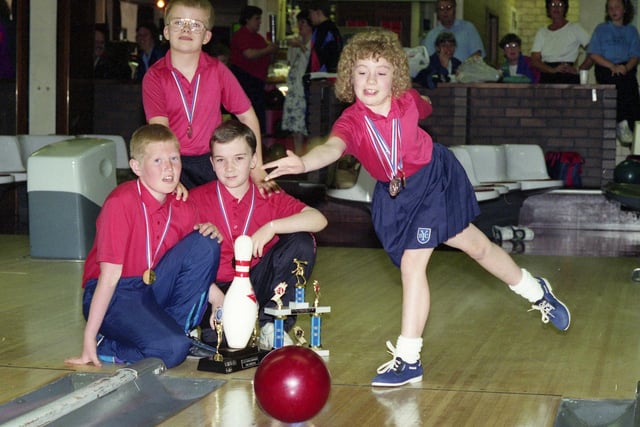 Top young Wearside bowlers were bang on target in a national competition involving 1,500 youngsters.  Pictured are top junior Craig Harris, back, Paul Matthews, front, and Michael Snow, and showing off her skills, Helen Dresser. But which year is this?