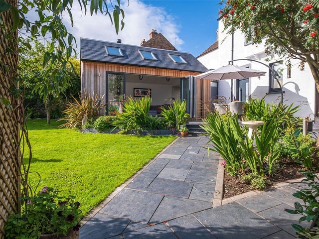 Current owners have added a modern extension, giving the home a contemporary 'grand designs' feel.
