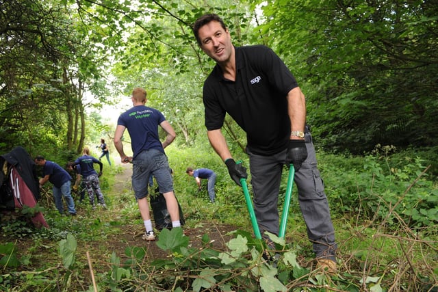 Software firm Sage UK's European President Bredan Flattery joins staff and volunteers to take part in a clean up of Monkton Dene four years ago.