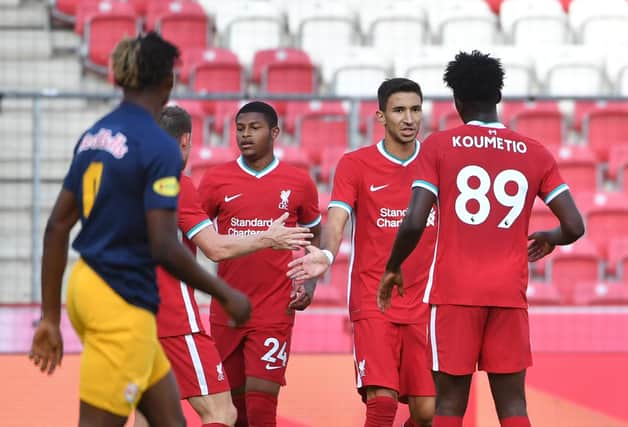 Liverpool's English striker Rhian Brewster (2nd Left) celebrates scoring with his team-mates during the friendly test match Liverpool v FC Salzburg in Salzburg, Austria on August 25 2020. (Photo by BARBARA GINDL / APA / AFP)