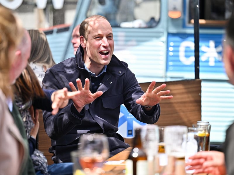Prince William watches the Scottish Cup Final with emergency responders at the Cold Town House in the Grassmarket rooftop bar in Edinburgh on 22 May.