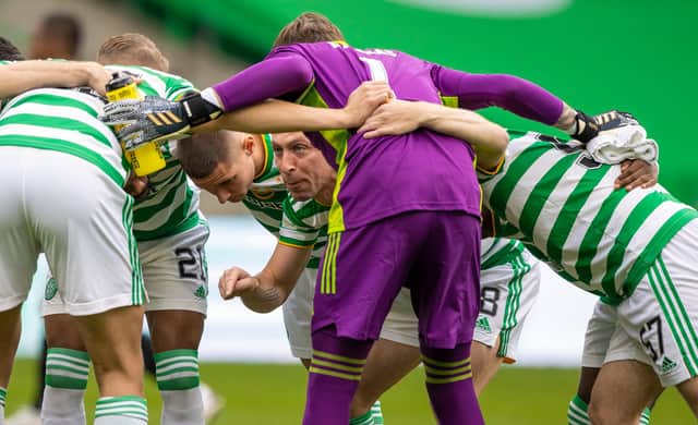 Celtic captain Scott Brown gives pre-match instructions in the huddle. Picture: SNS