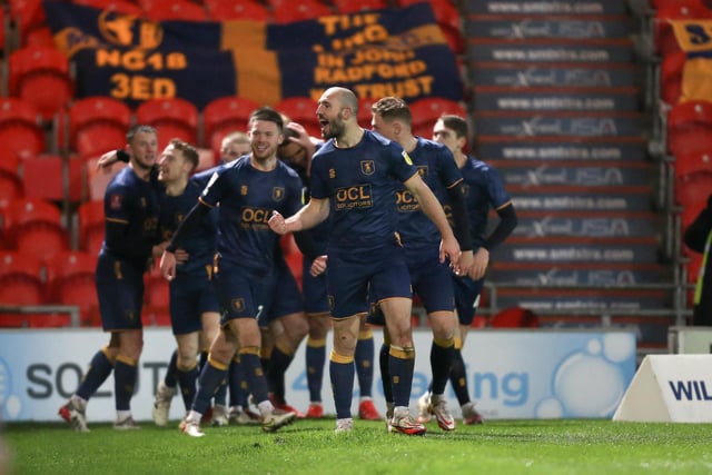 George Lapslie scored twice in 12 minutes as Mansfield marched on.