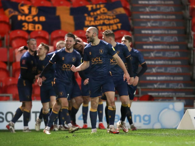 George Lapslie scored twice in 12 minutes as Mansfield marched on.