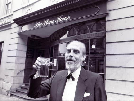 We've trawled the archives to bring you 17 photos of pubs in Sheffield taken during the 1980s. Pictured here is Alan Maxfield, manager of the Stone House pub on Church Street in 1988