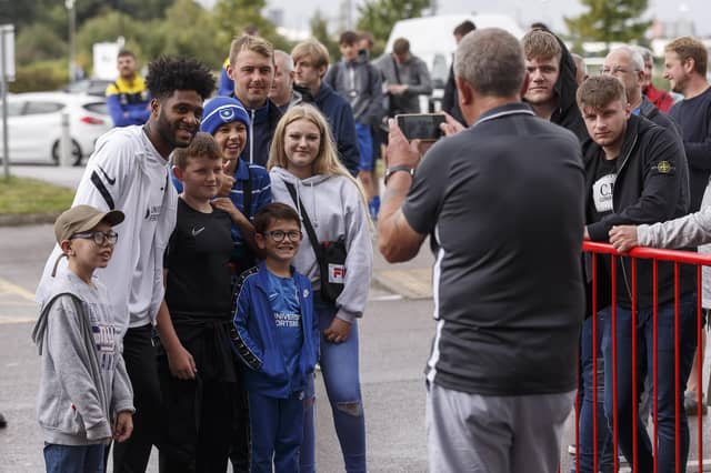 Ellis Harrison poses for a picture with fans before kick-off at the Keepmoat. Picture: Daniel Chesterton/phcimages.com
