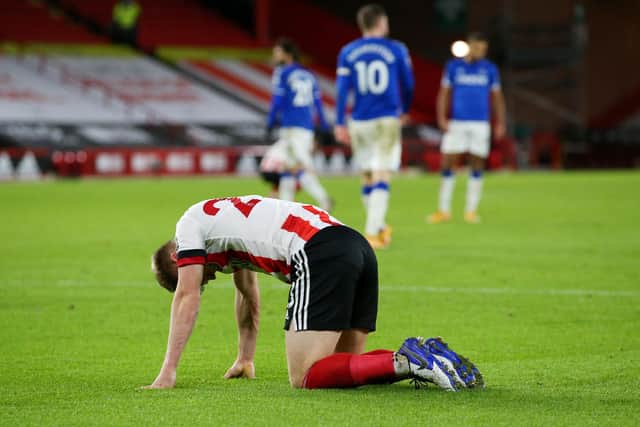 Ben Osborn of Sheffield United looks dejected following his team's defeat to Everton (Photo by Alex Livesey/Getty Images)