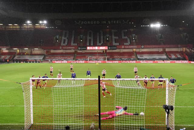 Sheffield United striker Billy Sharp scores the winner from the penalty spot in his side's 1-0 victory over Bristol City in the FA Cup fifth round at Bramall Lane last night. (Photo by Stu Forster/Getty Images)