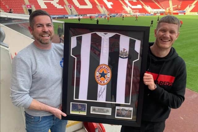 Kev Johnson arranged for a signed Alan Shearer shirt to be bought for Michael SMith after his 24-goal effort for Rotherham United last season.
