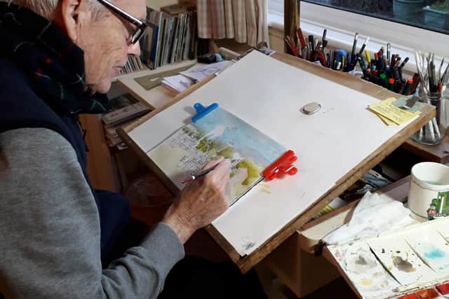Eric Leslie working on a painting 2019