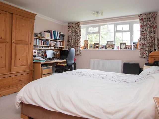 The first of four double bedrooms. It is bright and offers lots of room for wardrobes, storage and desk, if required.