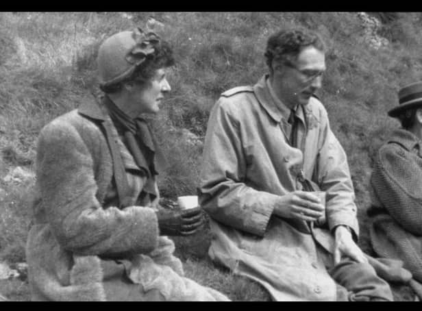 Ethel Haythornthwaite and John Dower on Hobhouse Committee Business mapping the boundary of the proposed National Park in circa 1945.