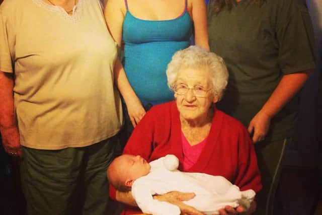 May Harrison pictured with five generations of her family. From left to right, daughter Beryl Gudgeon, great granddaughter, Georgia Lewis, granddaughter Karen Lewis and May holding her great great grandson, Harry.