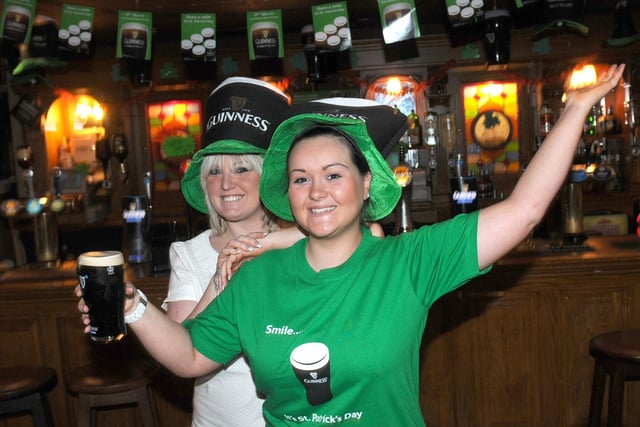 Rosie O' Grady's bar staff Rachael Garthwaite (left) and Sonia Price preparing for St Patrick's Day back in 2011.