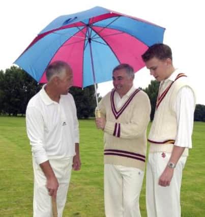 Doncaster cricket players hoping for a break in the rain so they can play in 2000.