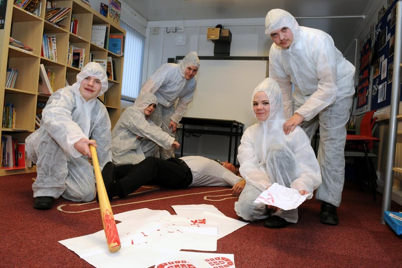 Epinay School pupils explore a crime scene whilst taking part in a forensic workshop. Can you spot someone you know in this 2013 photo?
