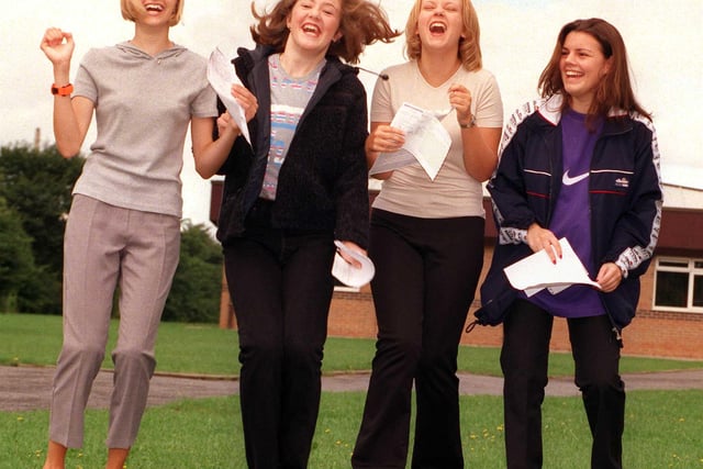 Celebrating their GCSE exam results are Hungerhill School pupils, from left, Jemma Robinson (9 A*s and one A), Venessa Wright (six A*s and four As), Alison Hammond (nine A*s) and Melanie Catt (eight A*s and one A). All the girls ar aged 16 in 1999