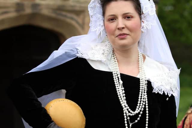 Mary Queen of Scots actor with a recreated c16th football taken by John Clarke