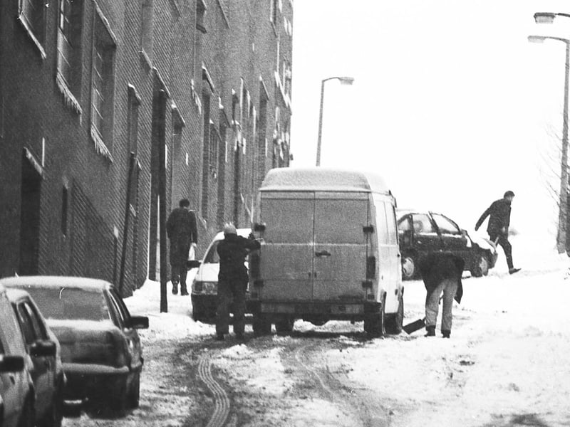 An uphill struggle in the snow in Sheffield city centre in February 1991