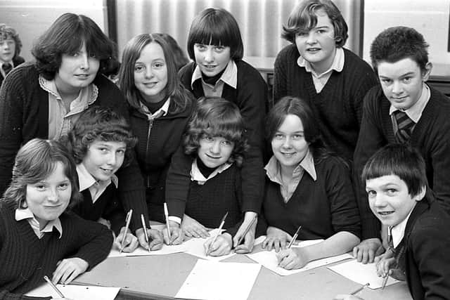School pupils learning letter-writing skills in 1980