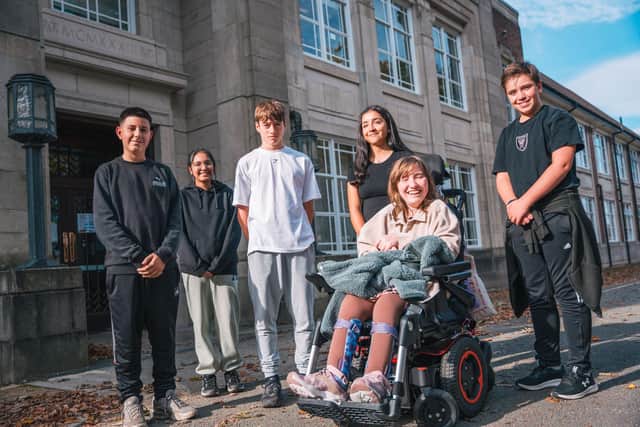 Students outside High Storrs School, in Sheffield. 