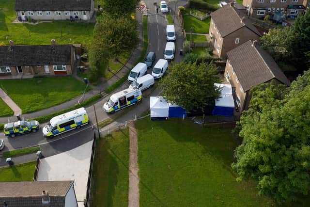 Police at the murder scene in Chandos Crescent, Killamarsh on September 21 2021.