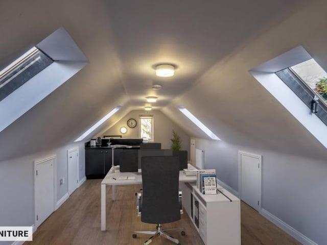 Upper floor of garage block.