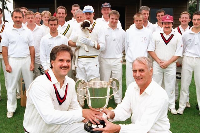 Geoff Rennison and Dave Kay with the DIstrict Cricket Leugue premier legaue torphy in 1997.