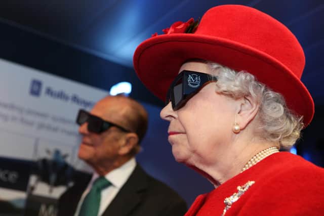 The Queen and Duke of Edinburgh wearing virtual reality glasses at the Nuclear AMRC launch in November 2010.