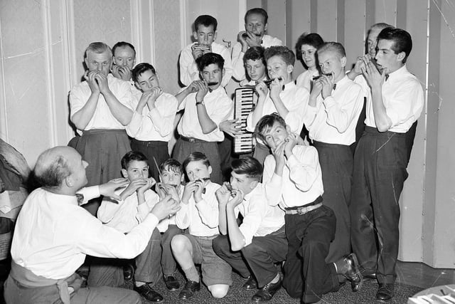The Harmonica Aces, from West Pilton, triumph at a talent contest held at the YMCA Theatre in July 1958.
